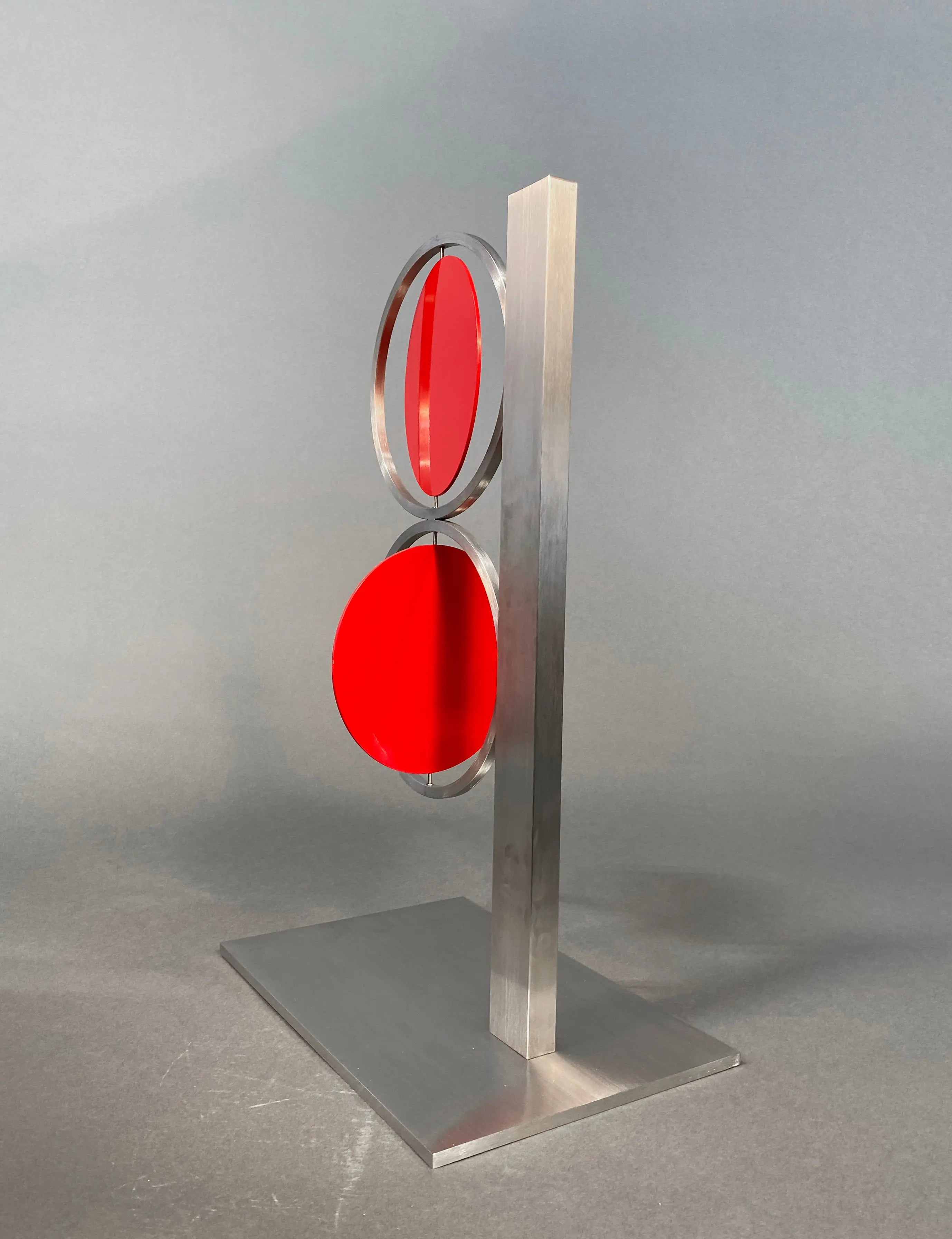 14134, Roger Phillips, 24 inch Red Figure Eight on Column, 2015