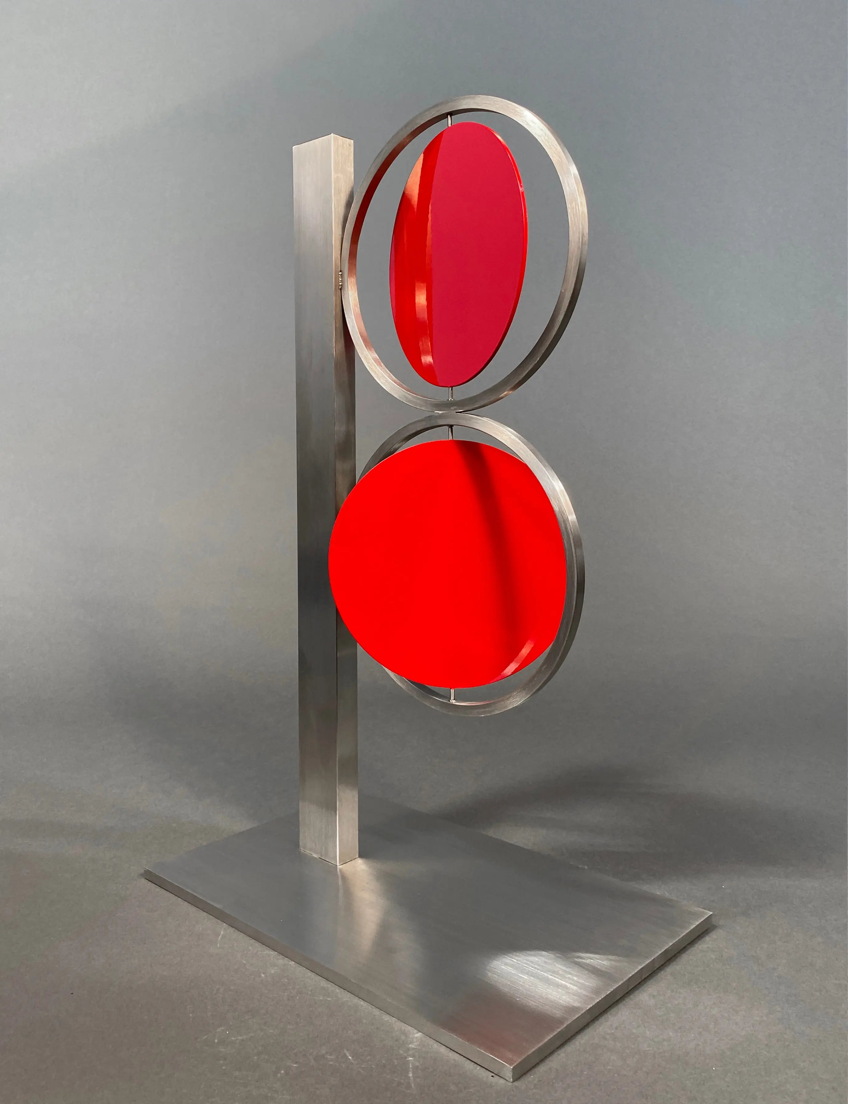 14134, Roger Phillips, 24 inch Red Figure Eight on Column, 2015