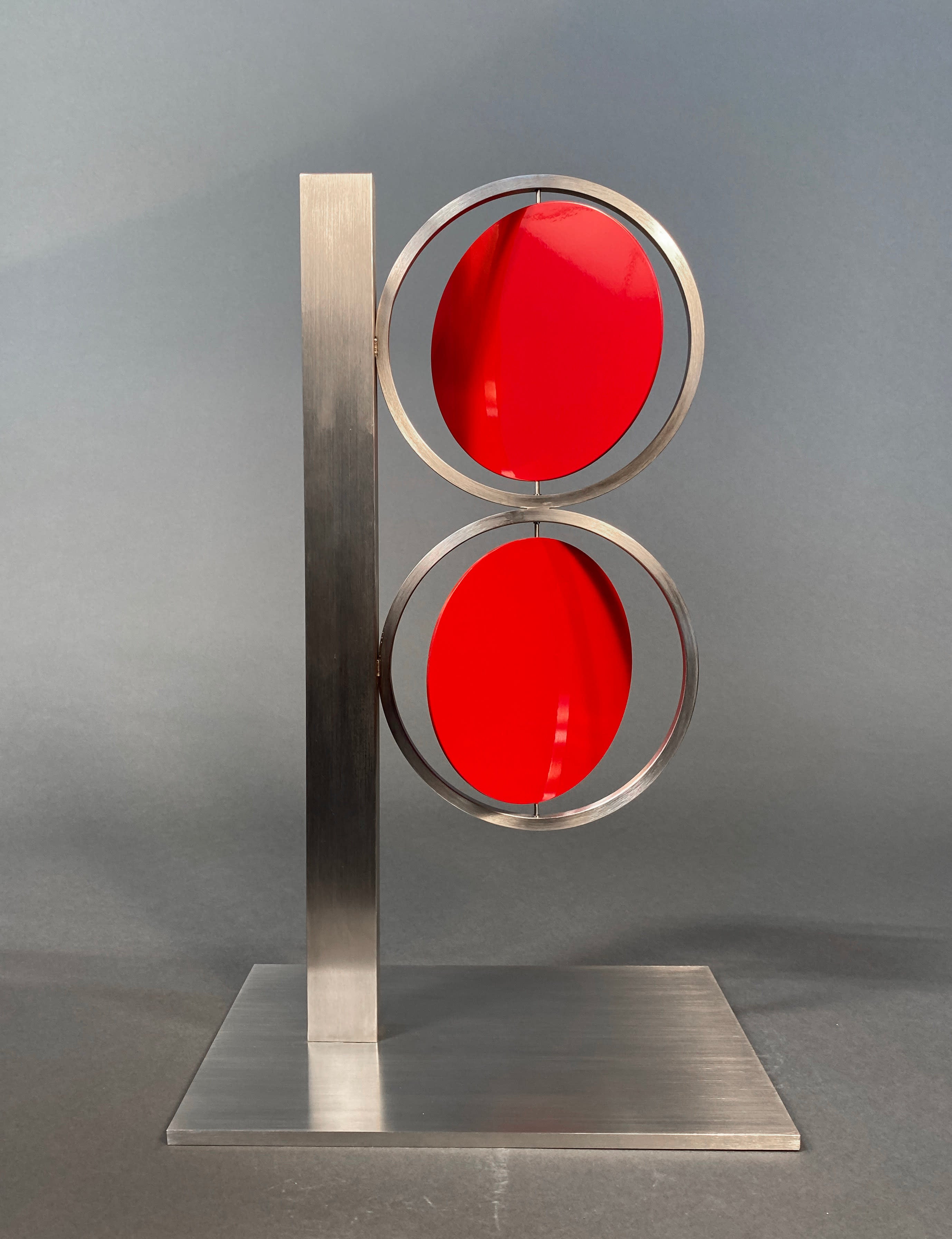 14134, Roger Phillips, 24 inch Red Figure Eight on Column, 2015